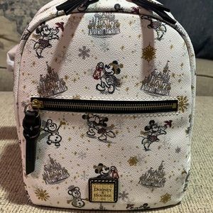 Brand new Dooney & Bourke Disney Mini backpack!!   Mickey and Minnie!